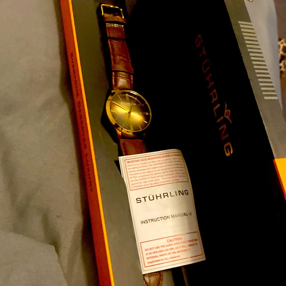 Stuhrling gold brown watch